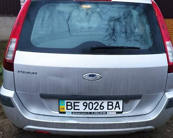 Серый Форд Фьюжн, объемом двигателя 1.39 л и пробегом 133 тыс. км за 4000 $, фото 3 на Automoto.ua
