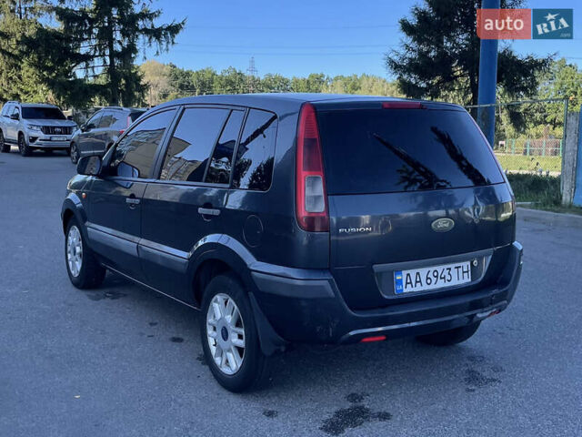 Сірий Форд Фьюжен, об'ємом двигуна 1.4 л та пробігом 237 тис. км за 3600 $, фото 4 на Automoto.ua