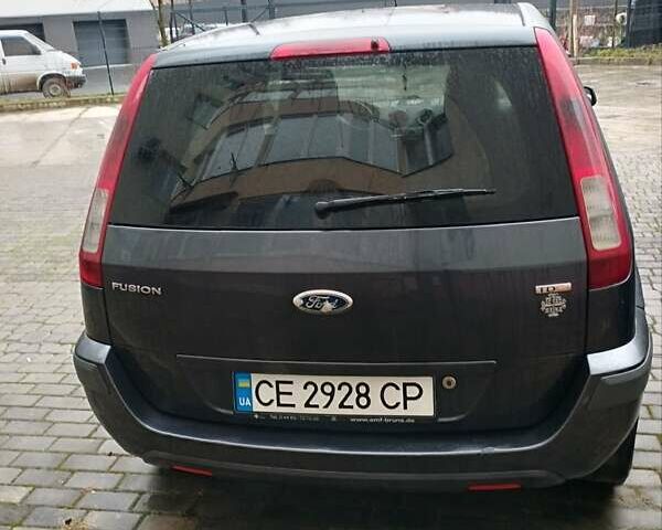 Сірий Форд Фьюжен, об'ємом двигуна 1.4 л та пробігом 303 тис. км за 4900 $, фото 9 на Automoto.ua