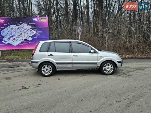 Серый Форд Фьюжн, объемом двигателя 1.39 л и пробегом 710 тыс. км за 2700 $, фото 7 на Automoto.ua