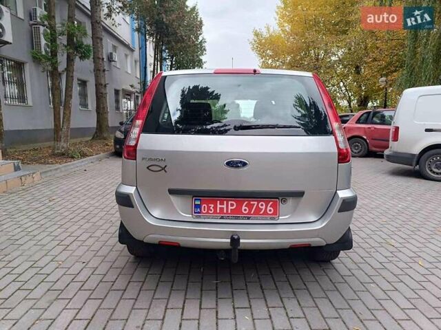 Серый Форд Фьюжн, объемом двигателя 1.4 л и пробегом 117 тыс. км за 6100 $, фото 7 на Automoto.ua