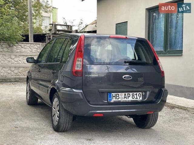 Серый Форд Фьюжн, объемом двигателя 1.4 л и пробегом 119 тыс. км за 5800 $, фото 8 на Automoto.ua