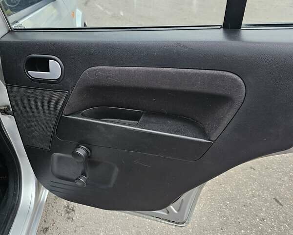 Серый Форд Фьюжн, объемом двигателя 1.39 л и пробегом 710 тыс. км за 2700 $, фото 18 на Automoto.ua