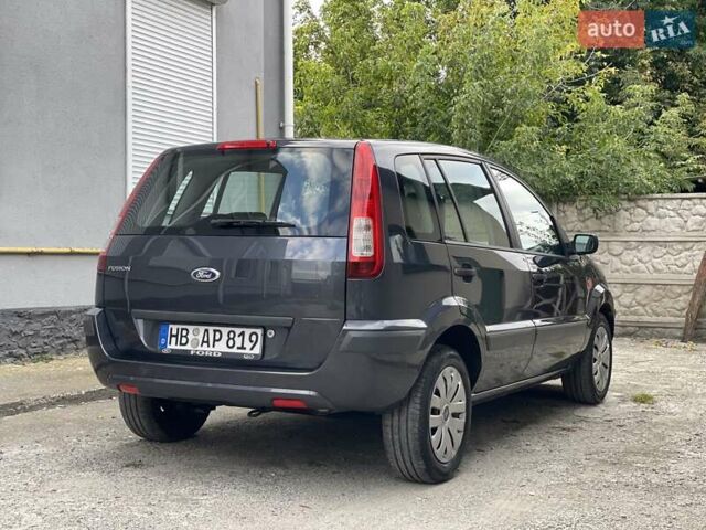 Серый Форд Фьюжн, объемом двигателя 1.4 л и пробегом 119 тыс. км за 5800 $, фото 9 на Automoto.ua
