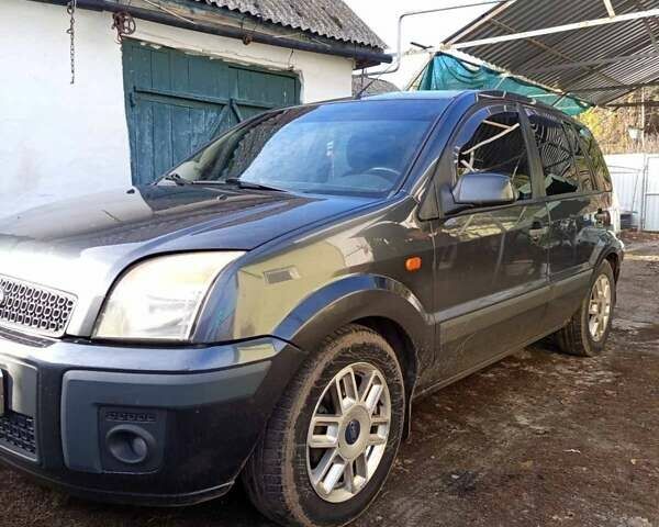 Серый Форд Фьюжн, объемом двигателя 1.39 л и пробегом 160 тыс. км за 5000 $, фото 4 на Automoto.ua