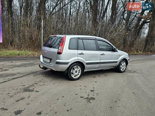 Серый Форд Фьюжн, объемом двигателя 1.39 л и пробегом 710 тыс. км за 2700 $, фото 8 на Automoto.ua