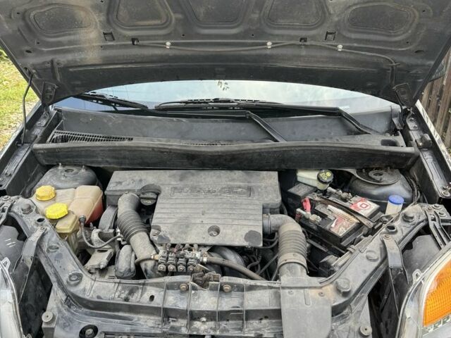 Серый Форд Фьюжн, объемом двигателя 1.4 л и пробегом 195 тыс. км за 5450 $, фото 7 на Automoto.ua