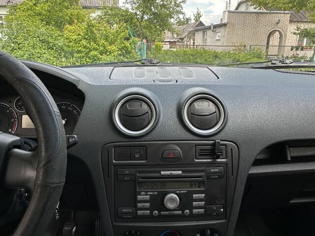 Серый Форд Фьюжн, объемом двигателя 1.4 л и пробегом 180 тыс. км за 5700 $, фото 7 на Automoto.ua