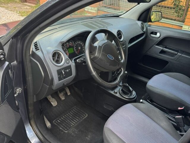 Серый Форд Фьюжн, объемом двигателя 1.4 л и пробегом 195 тыс. км за 5450 $, фото 4 на Automoto.ua