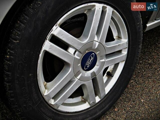 Сірий Форд Фьюжен, об'ємом двигуна 1.4 л та пробігом 235 тис. км за 4200 $, фото 4 на Automoto.ua