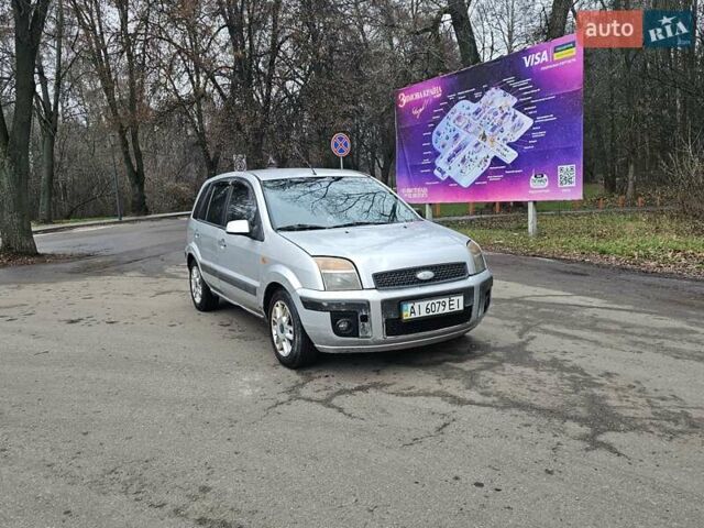 Серый Форд Фьюжн, объемом двигателя 1.39 л и пробегом 710 тыс. км за 2700 $, фото 11 на Automoto.ua