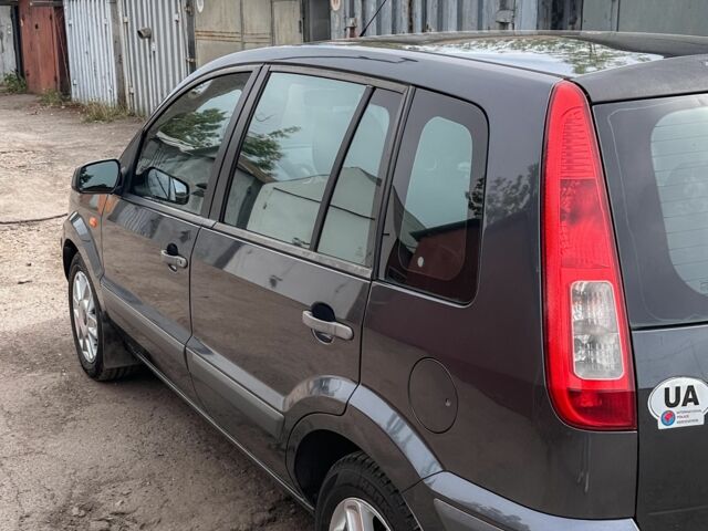 Серый Форд Фьюжн, объемом двигателя 1.4 л и пробегом 180 тыс. км за 5700 $, фото 5 на Automoto.ua