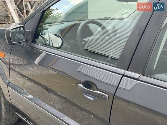 Сірий Форд Фьюжен, об'ємом двигуна 1.4 л та пробігом 119 тис. км за 5750 $, фото 54 на Automoto.ua