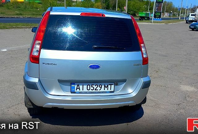 Серый Форд Фьюжн, объемом двигателя 1.4 л и пробегом 275 тыс. км за 4850 $, фото 4 на Automoto.ua