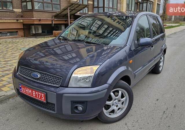 Серый Форд Фьюжн, объемом двигателя 1.6 л и пробегом 148 тыс. км за 5750 $, фото 1 на Automoto.ua