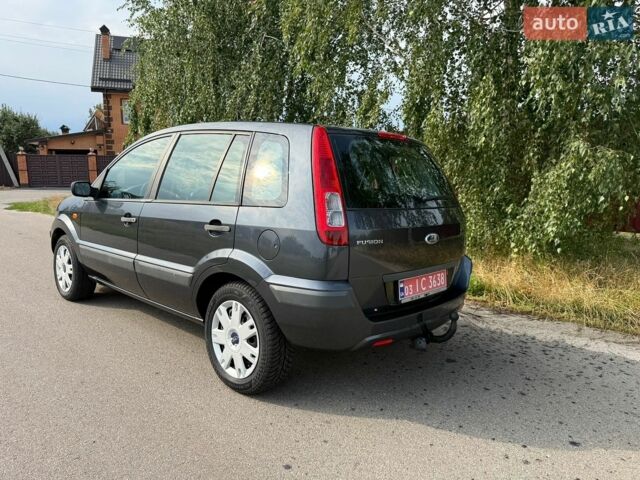 Серый Форд Фьюжн, объемом двигателя 1.4 л и пробегом 203 тыс. км за 6100 $, фото 3 на Automoto.ua