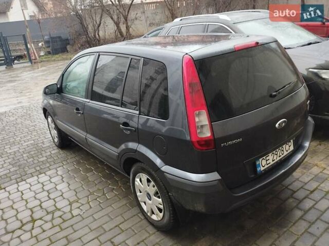 Сірий Форд Фьюжен, об'ємом двигуна 1.4 л та пробігом 303 тис. км за 4900 $, фото 4 на Automoto.ua