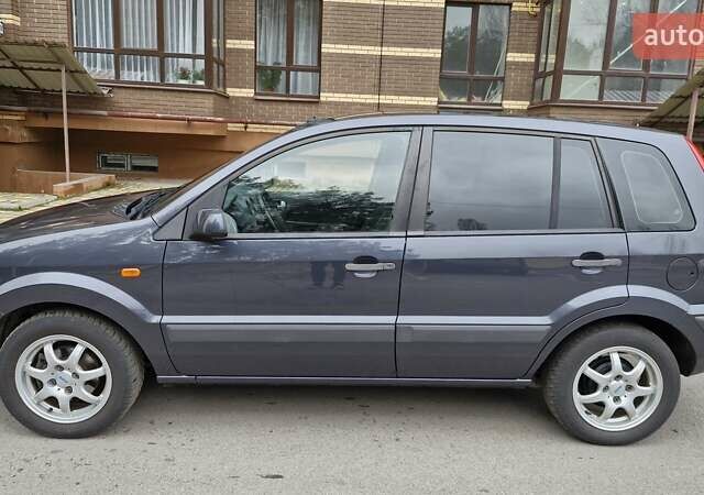 Серый Форд Фьюжн, объемом двигателя 1.6 л и пробегом 148 тыс. км за 5750 $, фото 2 на Automoto.ua