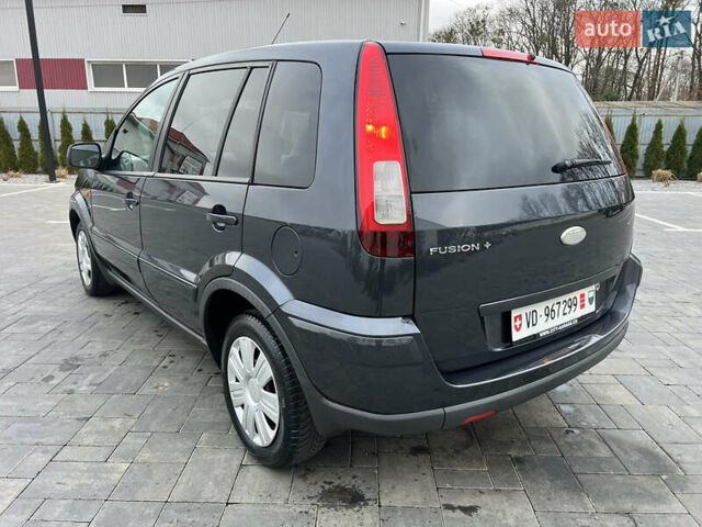 Серый Форд Фьюжн, объемом двигателя 1.6 л и пробегом 218 тыс. км за 6950 $, фото 18 на Automoto.ua