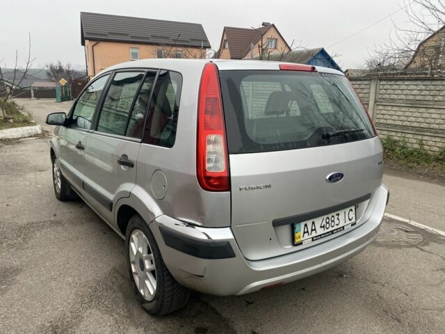 Сірий Форд Фьюжен, об'ємом двигуна 1.6 л та пробігом 289 тис. км за 4599 $, фото 4 на Automoto.ua