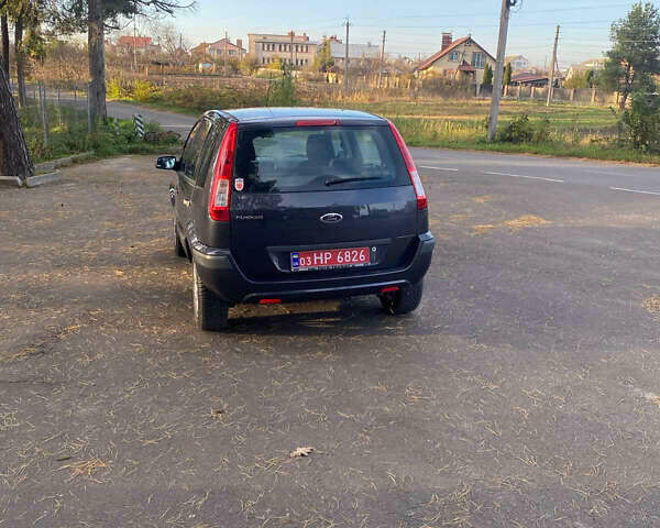 Серый Форд Фьюжн, объемом двигателя 1.4 л и пробегом 138 тыс. км за 5900 $, фото 2 на Automoto.ua