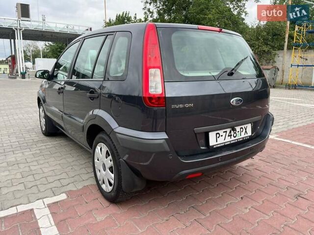 Серый Форд Фьюжн, объемом двигателя 1.4 л и пробегом 165 тыс. км за 5190 $, фото 4 на Automoto.ua