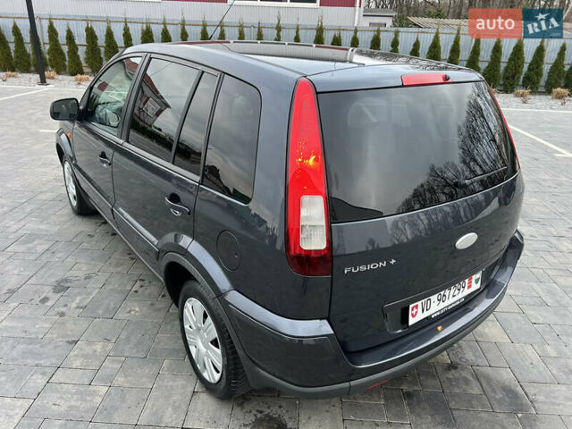 Серый Форд Фьюжн, объемом двигателя 1.6 л и пробегом 218 тыс. км за 6950 $, фото 19 на Automoto.ua