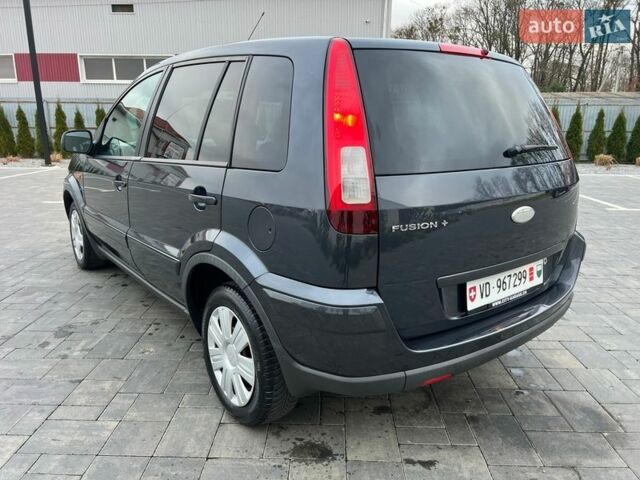 Серый Форд Фьюжн, объемом двигателя 1.6 л и пробегом 218 тыс. км за 6550 $, фото 18 на Automoto.ua