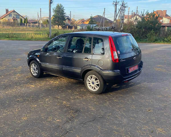 Серый Форд Фьюжн, объемом двигателя 1.4 л и пробегом 138 тыс. км за 5900 $, фото 4 на Automoto.ua