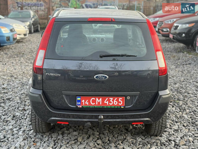 Серый Форд Фьюжн, объемом двигателя 1.4 л и пробегом 152 тыс. км за 6499 $, фото 4 на Automoto.ua