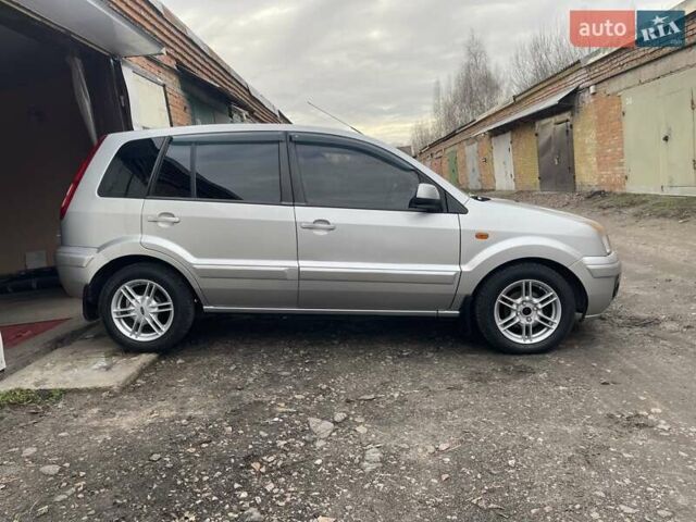 Сірий Форд Фьюжен, об'ємом двигуна 1.39 л та пробігом 128 тис. км за 5699 $, фото 5 на Automoto.ua