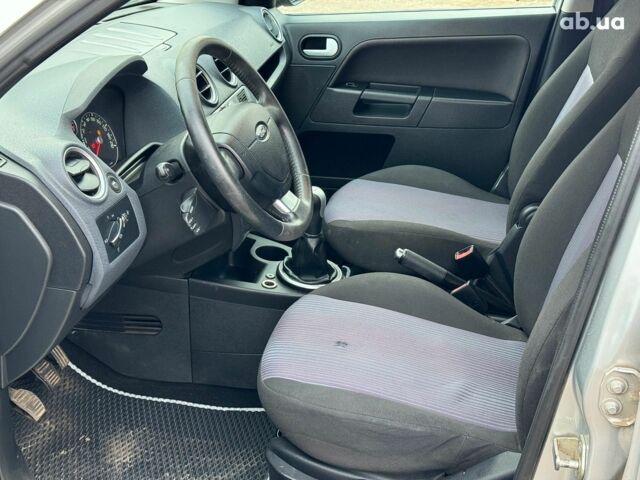 Серый Форд Фьюжн, объемом двигателя 1.6 л и пробегом 235 тыс. км за 6790 $, фото 12 на Automoto.ua