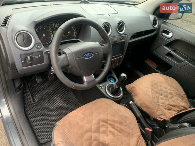 Серый Форд Фьюжн, объемом двигателя 1.39 л и пробегом 188 тыс. км за 6500 $, фото 10 на Automoto.ua