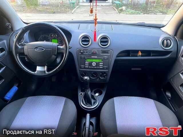 Серый Форд Фьюжн, объемом двигателя 1.4 л и пробегом 130 тыс. км за 5699 $, фото 11 на Automoto.ua