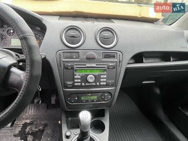 Сірий Форд Фьюжен, об'ємом двигуна 1.6 л та пробігом 343 тис. км за 4500 $, фото 6 на Automoto.ua