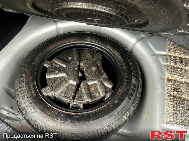 Серый Форд Фьюжн, объемом двигателя 1.6 л и пробегом 203 тыс. км за 5999 $, фото 11 на Automoto.ua