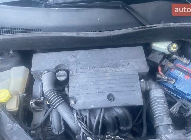 Серый Форд Фьюжн, объемом двигателя 1.4 л и пробегом 226 тыс. км за 4300 $, фото 11 на Automoto.ua