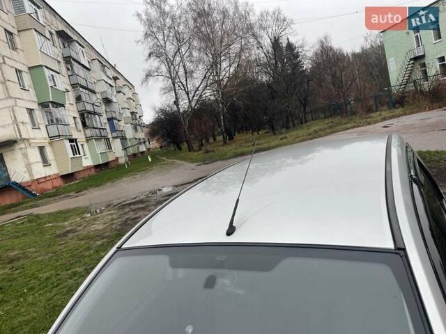 Сірий Форд Фьюжен, об'ємом двигуна 1.4 л та пробігом 129 тис. км за 5600 $, фото 6 на Automoto.ua