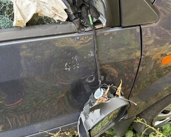 Серый Форд Фьюжн, объемом двигателя 1.39 л и пробегом 46 тыс. км за 2200 $, фото 12 на Automoto.ua