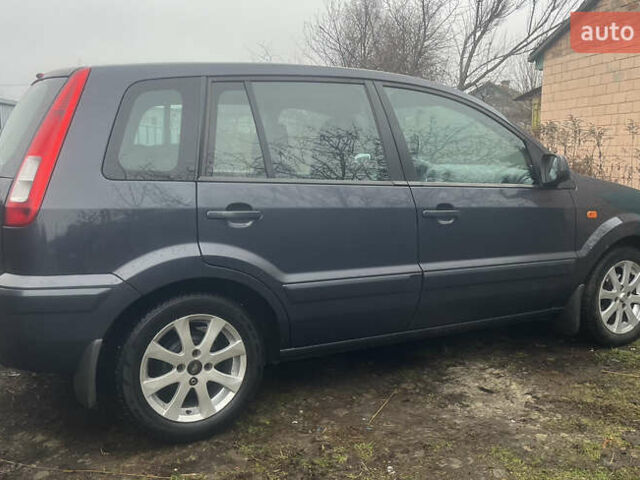 Серый Форд Фьюжн, объемом двигателя 1.4 л и пробегом 139 тыс. км за 5600 $, фото 3 на Automoto.ua