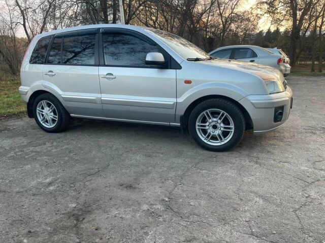 Серый Форд Фьюжн, объемом двигателя 1.4 л и пробегом 130 тыс. км за 5699 $, фото 7 на Automoto.ua