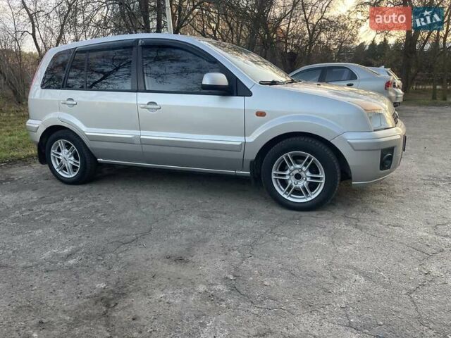 Серый Форд Фьюжн, объемом двигателя 1.4 л и пробегом 130 тыс. км за 5699 $, фото 7 на Automoto.ua