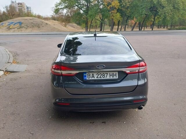 Серый Форд Фьюжн, объемом двигателя 2.5 л и пробегом 97 тыс. км за 12400 $, фото 5 на Automoto.ua