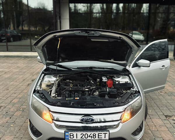 Серый Форд Фьюжн, объемом двигателя 2.49 л и пробегом 217 тыс. км за 7000 $, фото 10 на Automoto.ua