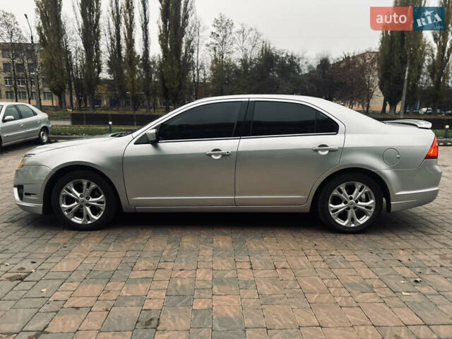 Серый Форд Фьюжн, объемом двигателя 2.49 л и пробегом 217 тыс. км за 7000 $, фото 4 на Automoto.ua