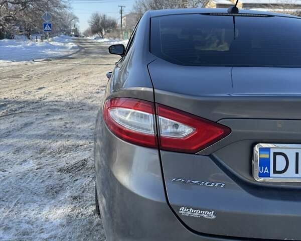 Сірий Форд Фьюжен, об'ємом двигуна 2 л та пробігом 150 тис. км за 11100 $, фото 8 на Automoto.ua