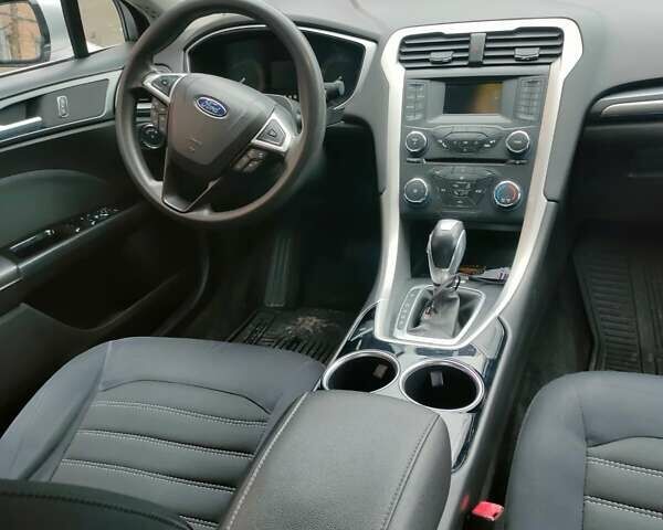 Серый Форд Фьюжн, объемом двигателя 1.6 л и пробегом 232 тыс. км за 8300 $, фото 14 на Automoto.ua