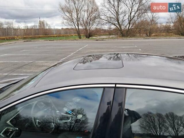 Серый Форд Фьюжн, объемом двигателя 1.6 л и пробегом 198 тыс. км за 8300 $, фото 7 на Automoto.ua