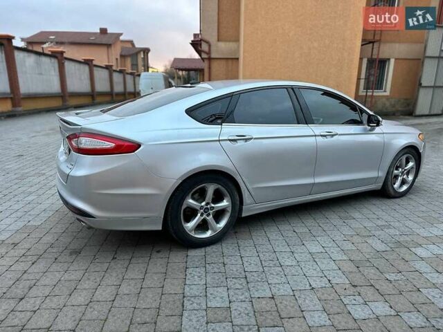 Серый Форд Фьюжн, объемом двигателя 1.6 л и пробегом 255 тыс. км за 8499 $, фото 5 на Automoto.ua