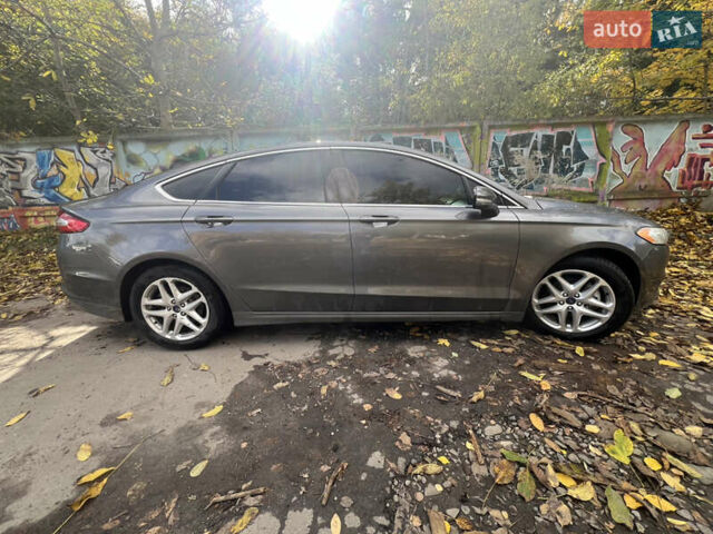 Серый Форд Фьюжн, объемом двигателя 1.6 л и пробегом 165 тыс. км за 8999 $, фото 14 на Automoto.ua